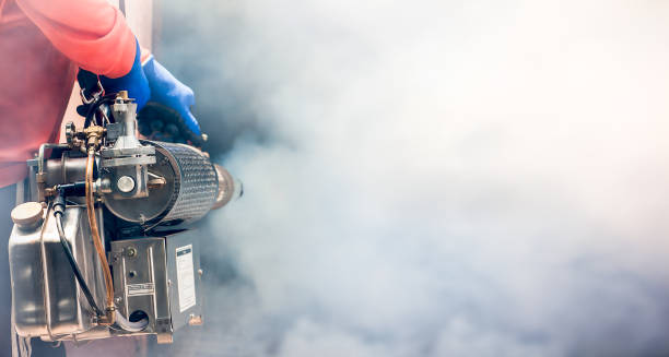 An E Consultants technician treating a property in Lagos